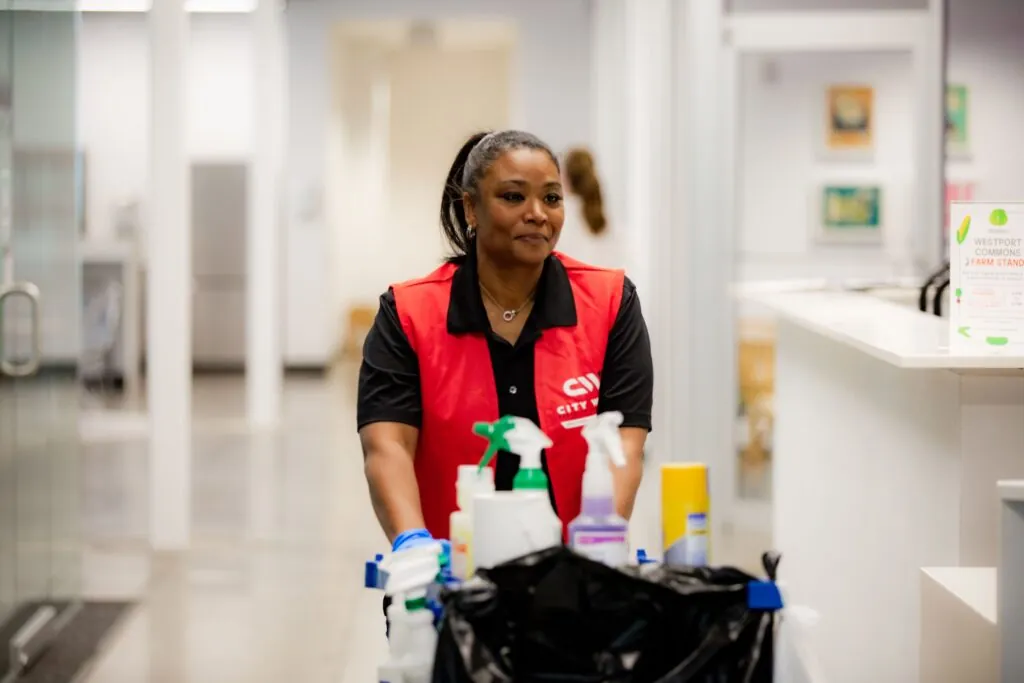 Day porter with janitorial cart.